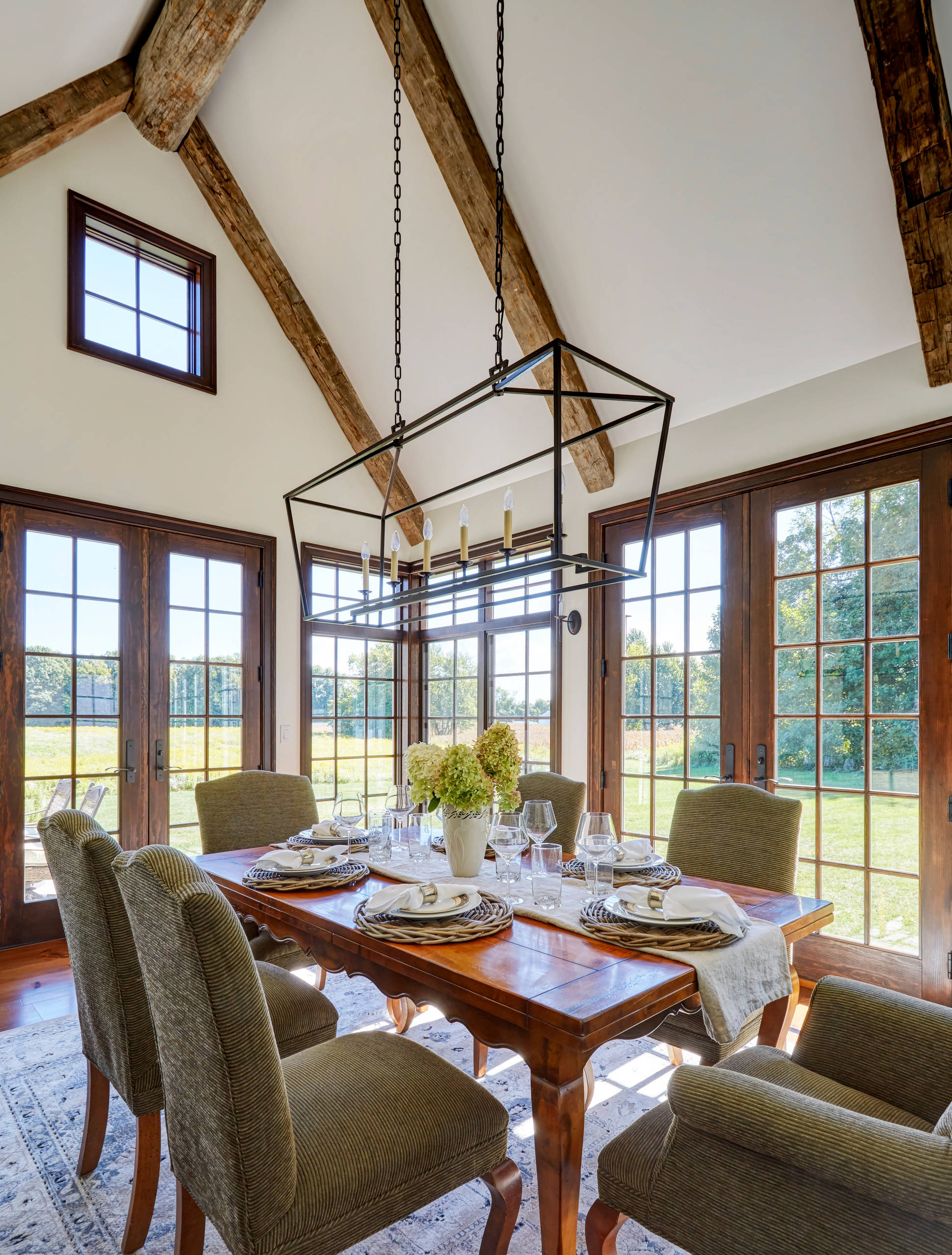Brightening Up, White Vaulted Ceilings with Beams for an Airy Ambiance