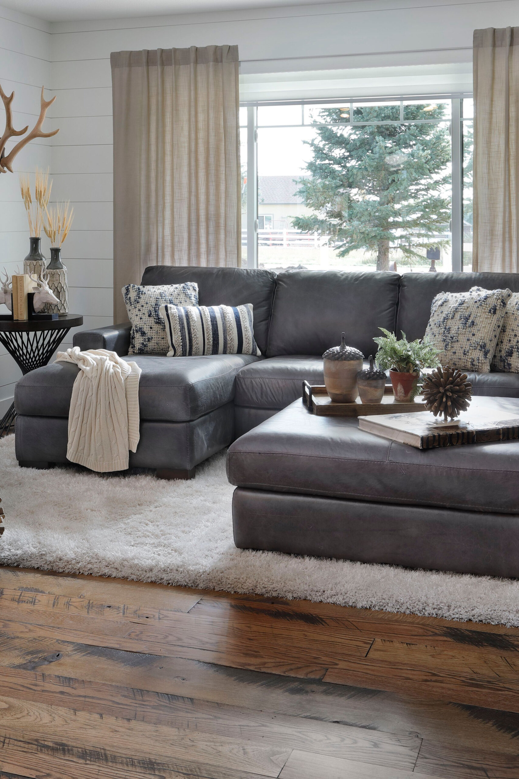 How to Make a Gray Sectional Living Room Feel Warm and Inviting
