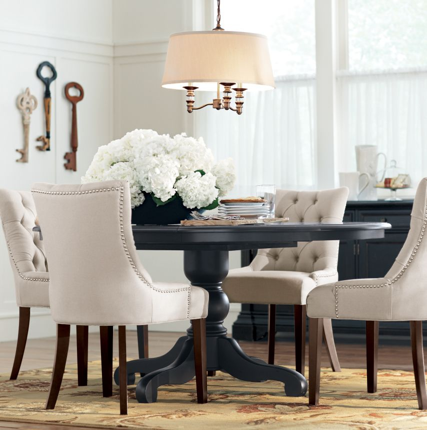 A Round Dining Table Makes For More Intimate Gatherings. | Ideas For ... with regard to From Intimate Dinners to Grand Gatherings Dining Tables With Two Leaves Explained