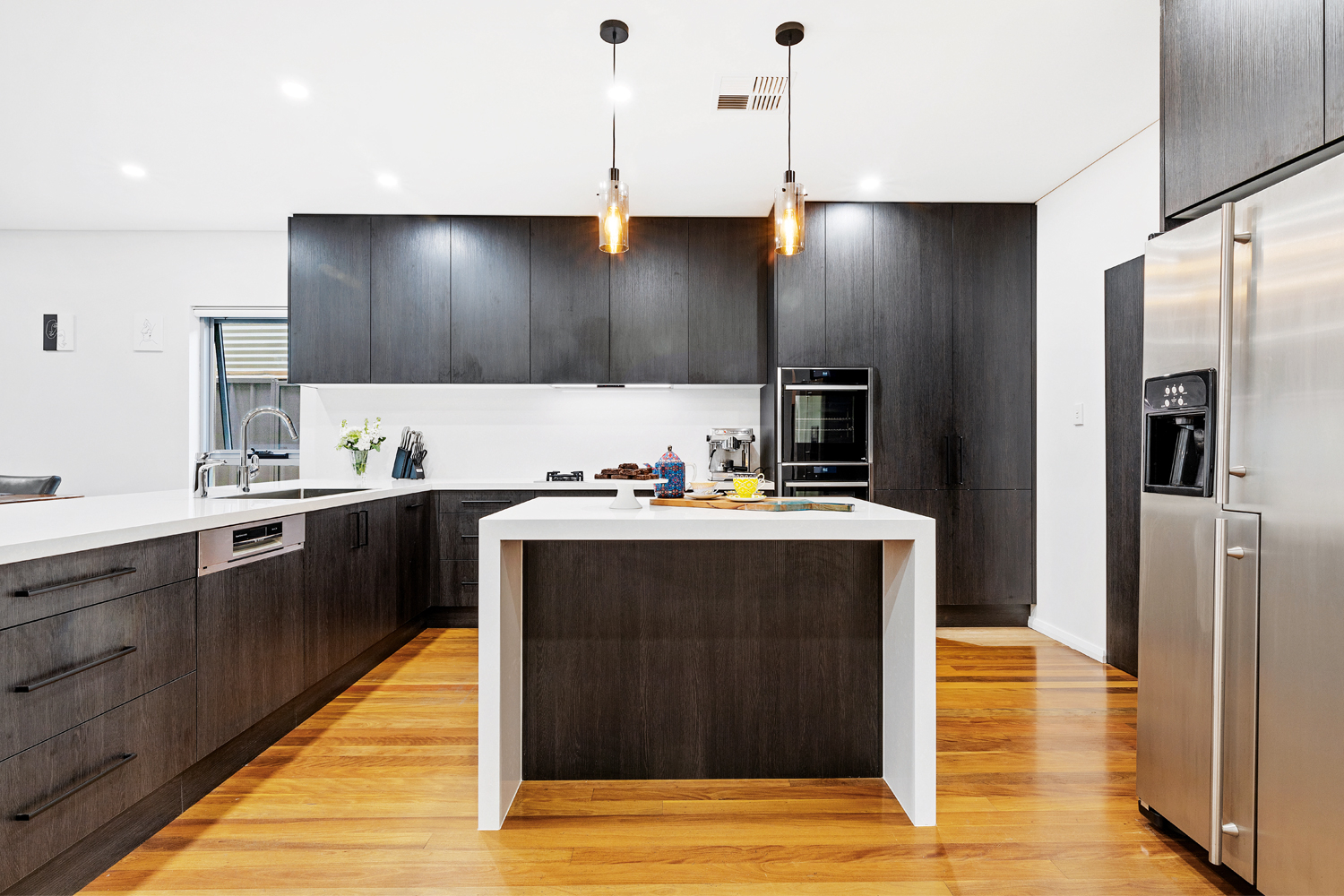 A Streamlined Kitchen With Optimised Storage Solutions pertaining to