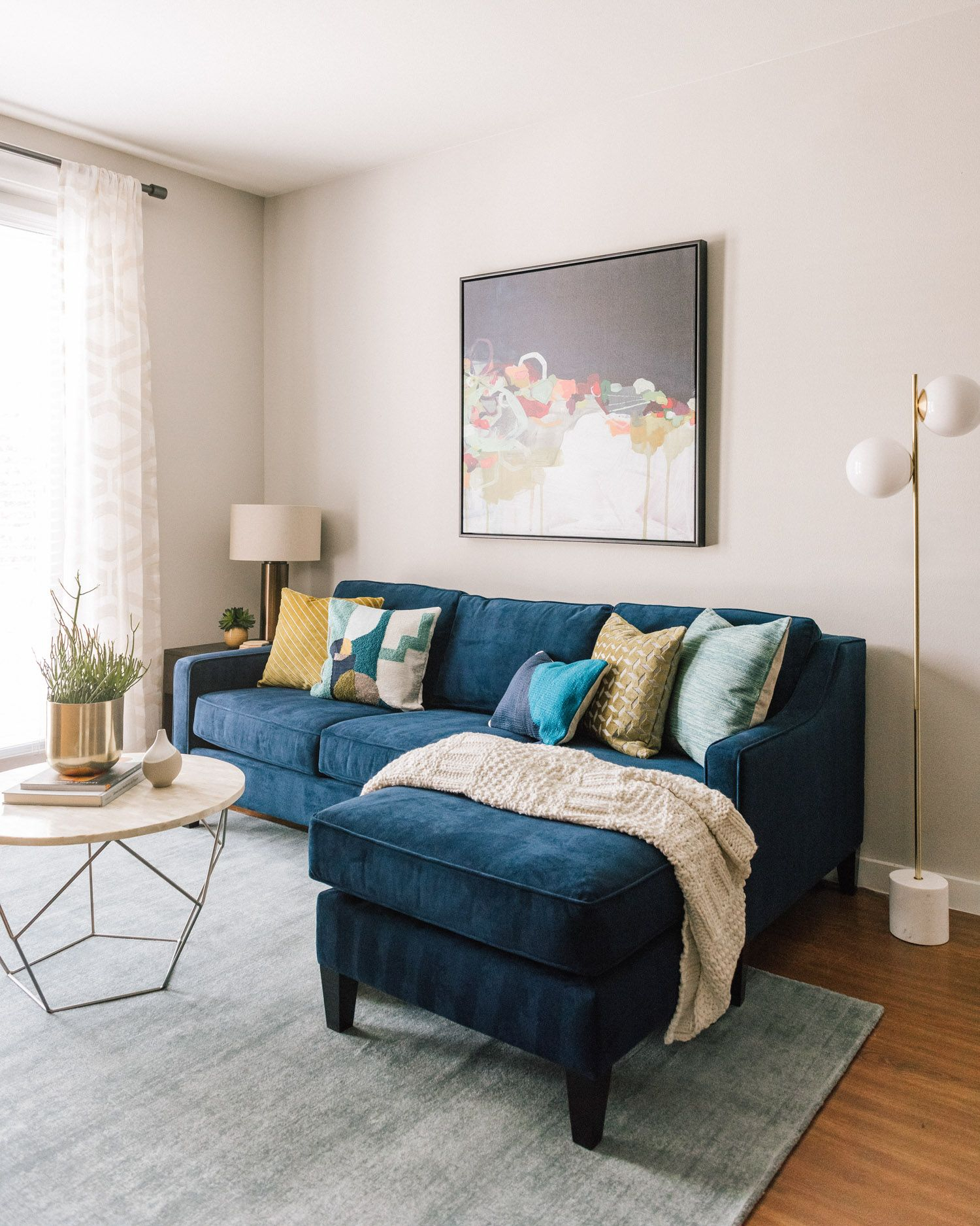 Apartment Refresh: A Reversible Sectional For The Win - Front + Main In ... throughout Transform Your Space with Inspiring Blue Sectional Ideas