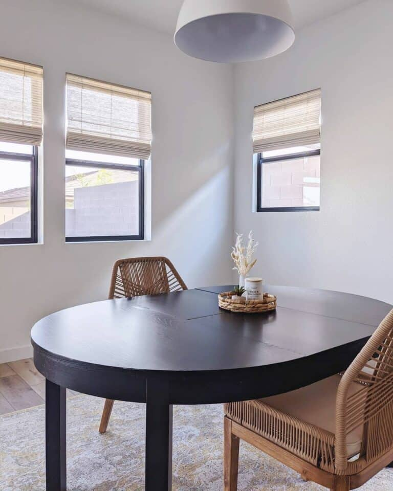 Black Wood Oval Dining Table With Woven Chairs - Soul &amp;Amp; Lane throughout The Ultimate Guide to Choosing an Oval Dining Table with Six Chairs