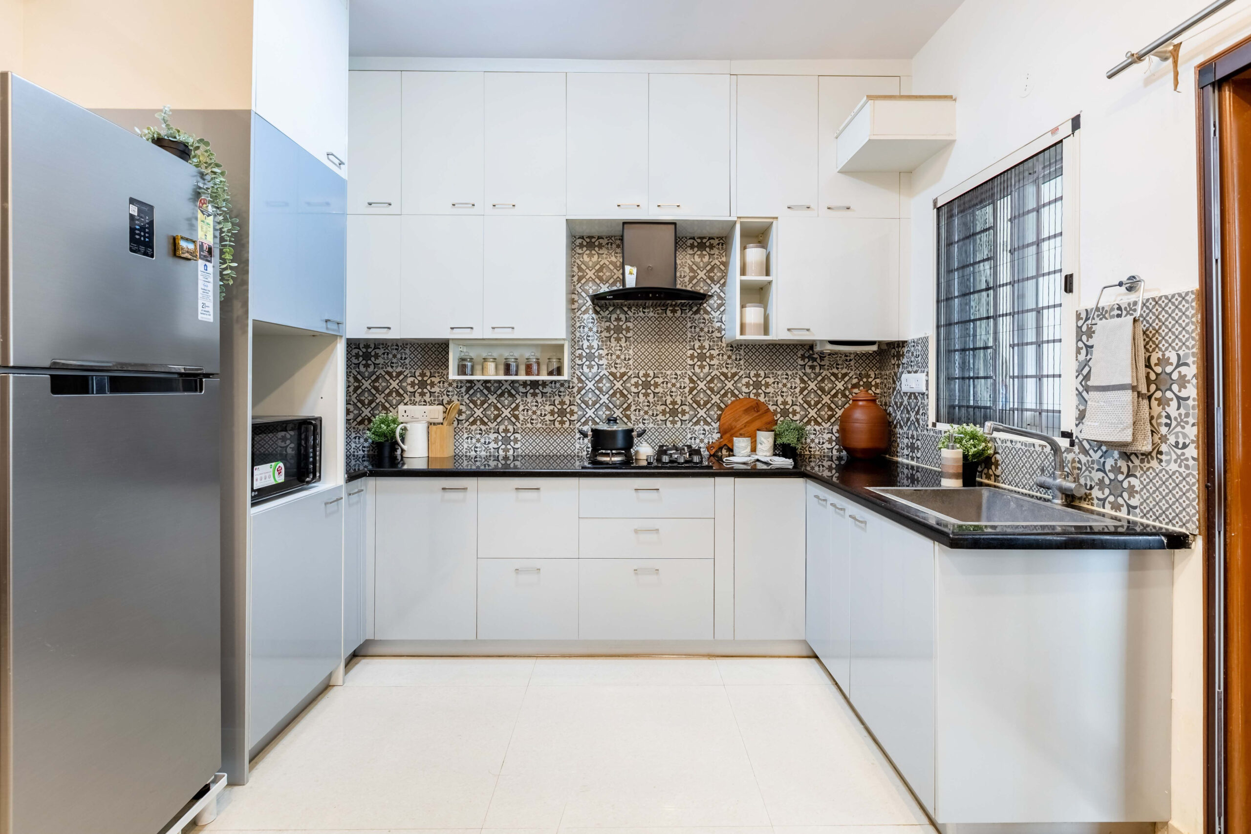 Spacious Modular Kitchen Design With Light Blue And White Storage Units ... with regard to