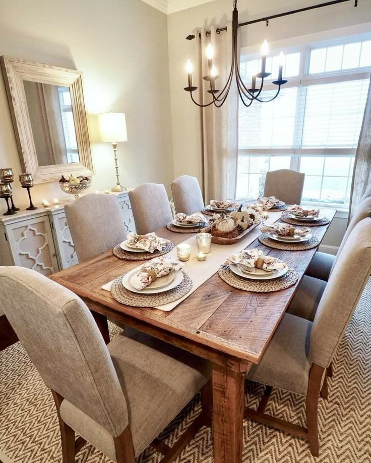 The Dining Room Table Is Set With Dishes And Place Settings For Six ... with regard to Crafting Your Gathering Place Building a Dining Room Table That Tells a Story