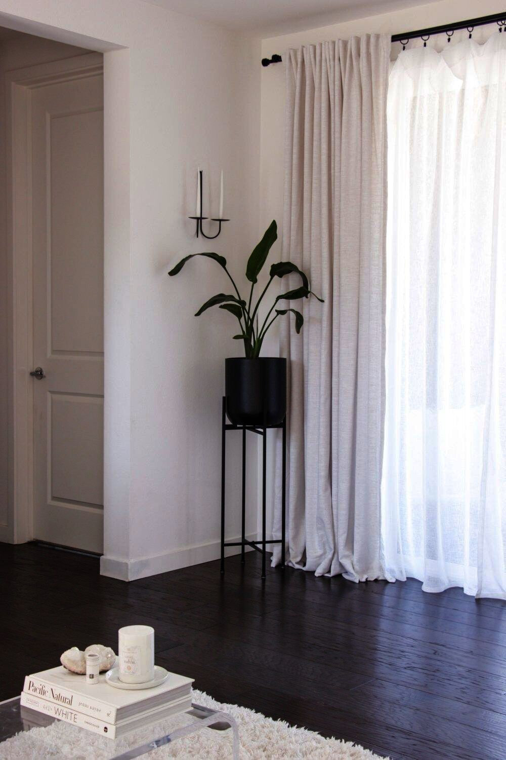 From Drab to Dreamy Achieving a Bright Living Room with White Curtains