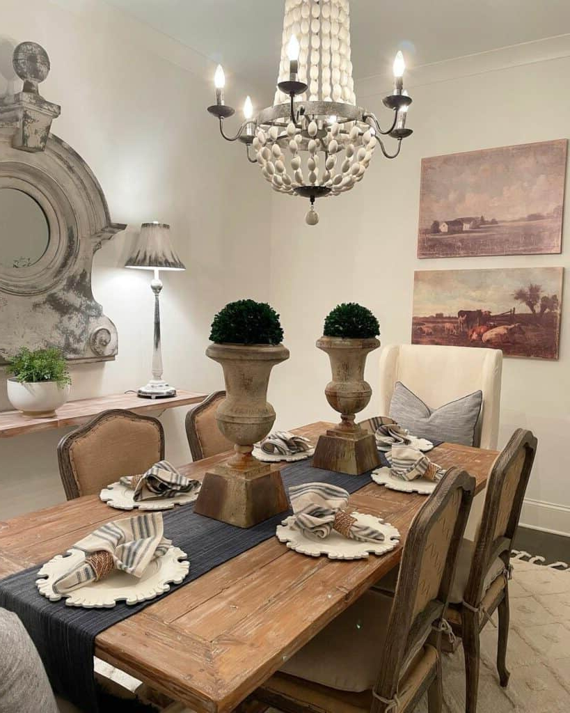 Farmhouse Dining Room Table Décor With Topiaries - Soul &amp; Lane for Simple farmhouse table settings that create cozy dining experiences